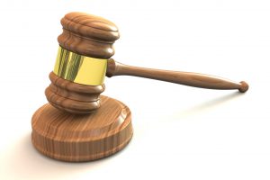 A judge's gavel used in courtrooms when settling legal disputes