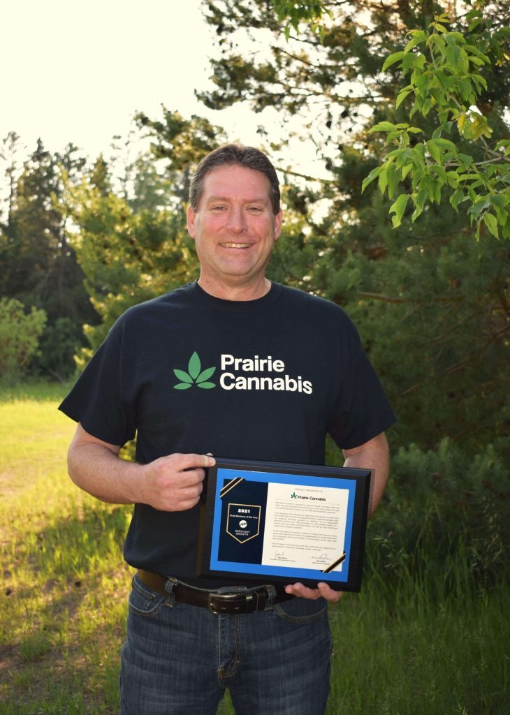 Jim Southam holding award