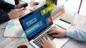 Partnership working at a desk coming up with their small business idea