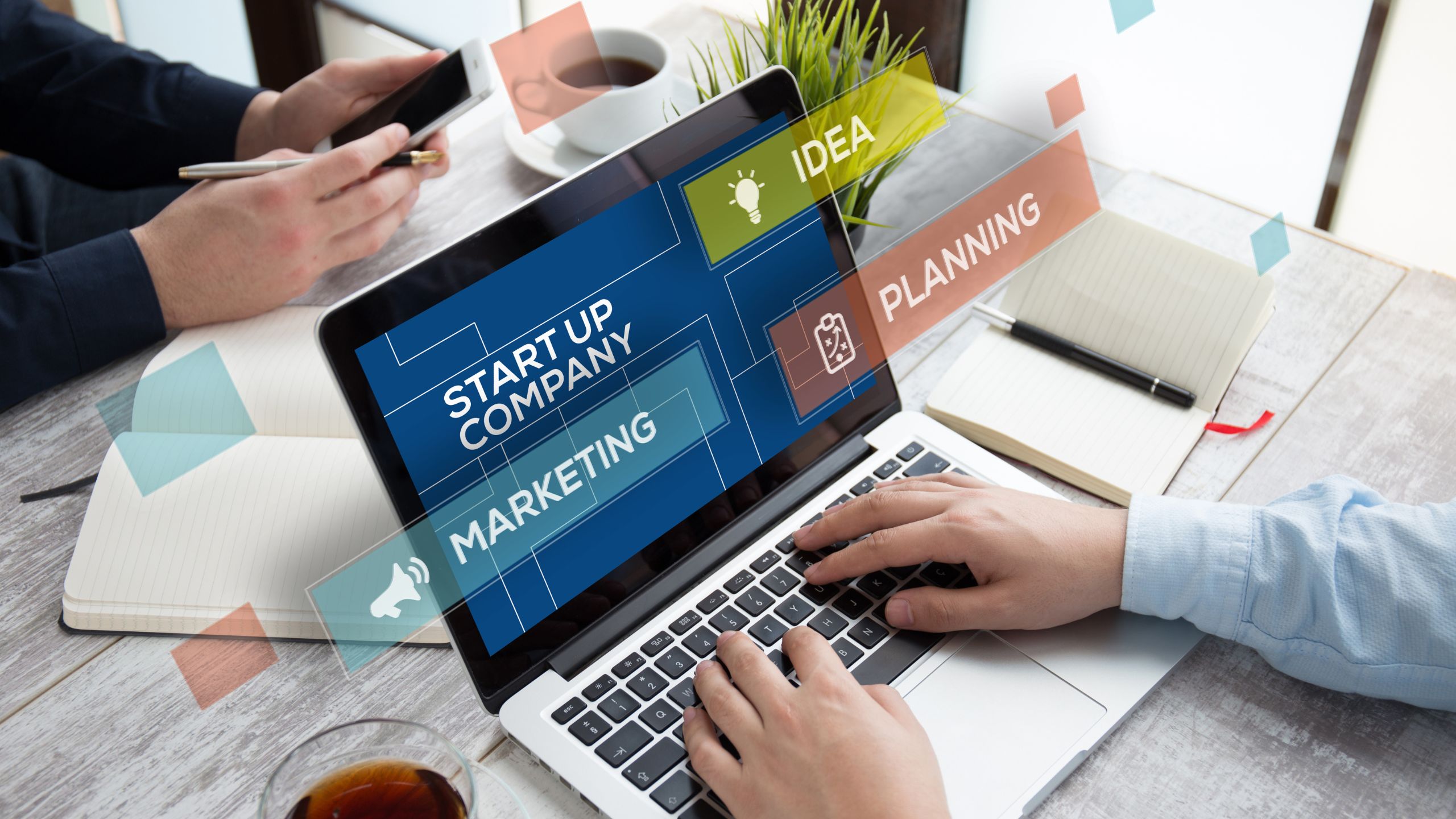 Partnership working at a desk coming up with their small business idea
