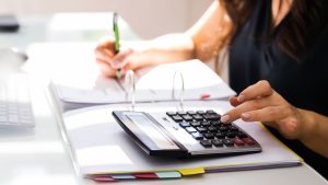 A small business owner managing their own bookkeeping