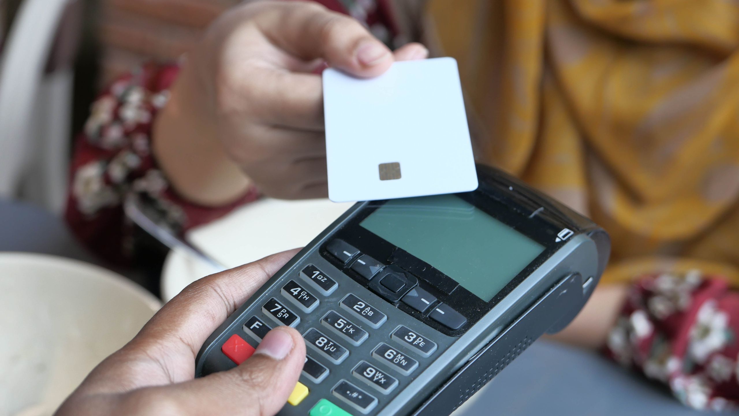 A small Canadian business taking a debit transaction for digital payment processing