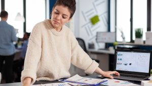 A small business owner utilizing expense management software