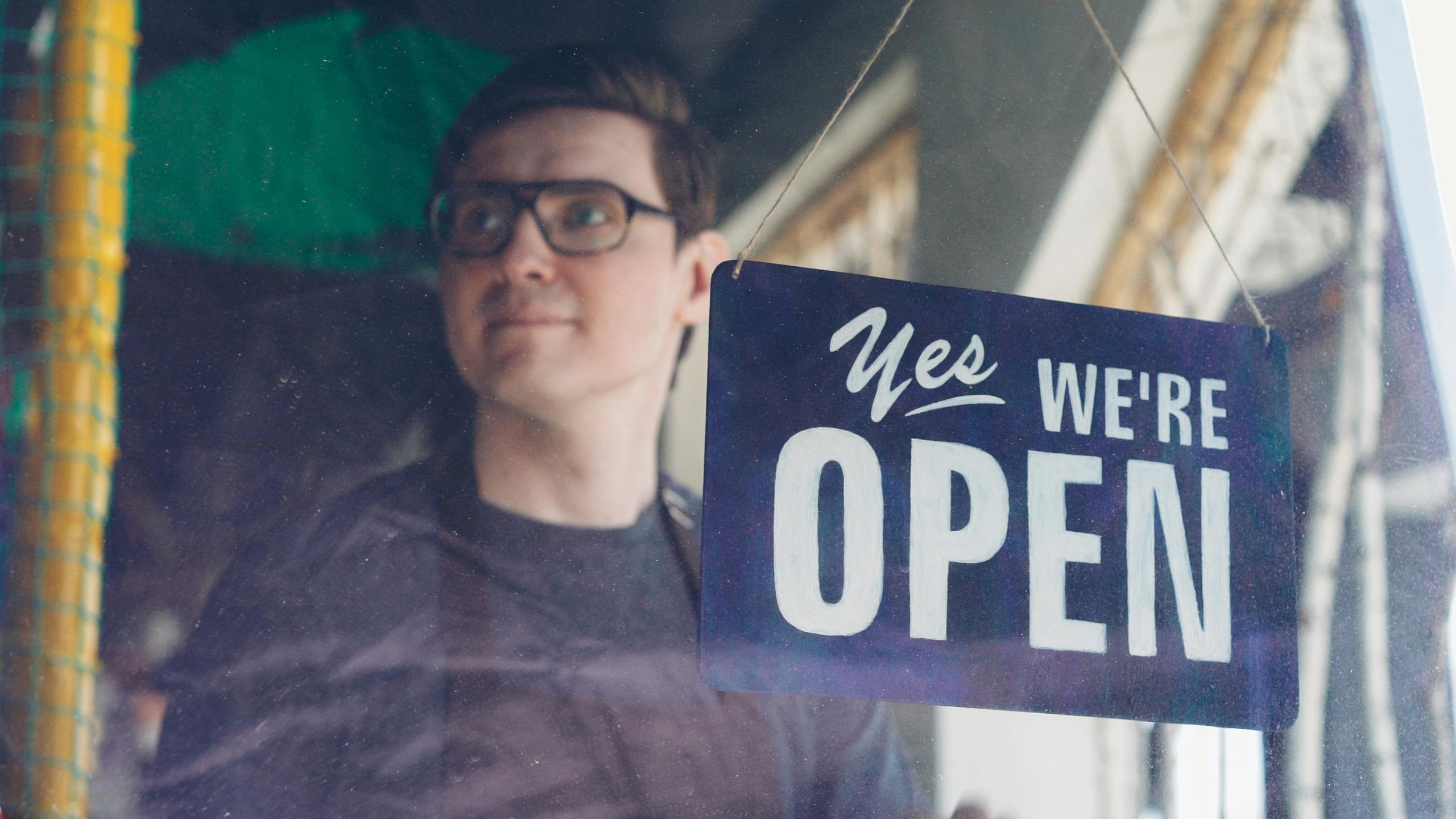 A Canadian business open looking proudly as their business remains strong in recession