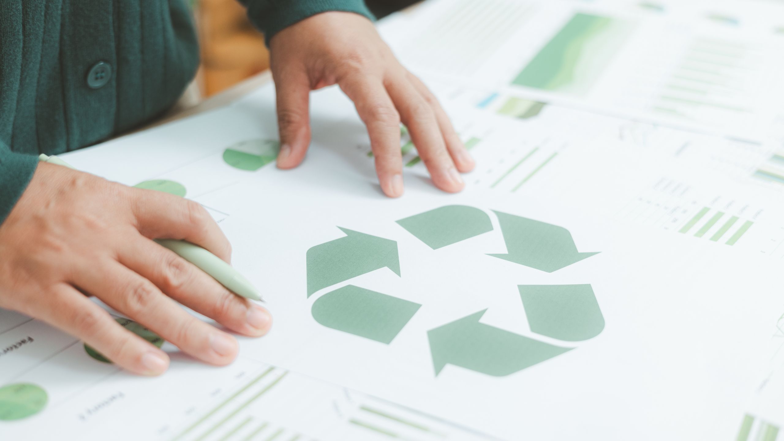 A Canadian business owner planning out their sustainability practices